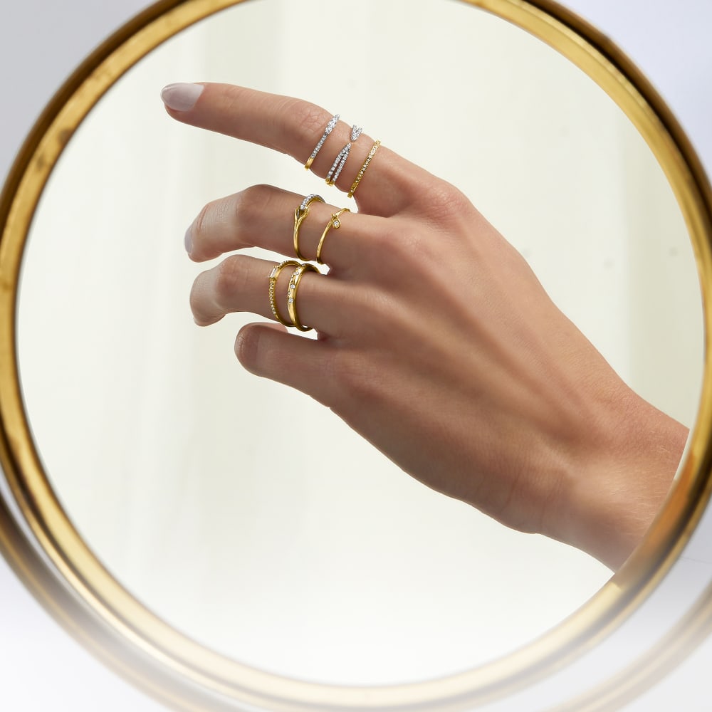 All That Glitters. Stay on the nice list and give them glowing 14kt gold jewelry!