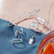 .10 ct. t.w. Diamond Huggie Hoop Earrings in Sterling Silver