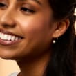 5.5-6mm Cultured Pearl Spiral Hoop Earrings in 14kt Yellow Gold