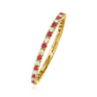.18 ct. t.w. Ruby and .13 ct. t.w. Diamond Eternity Band in 14kt Yellow Gold